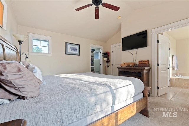 3052 N Christian Way, Meridian, ID 83646 - bedroom with vaulted ceiling, a walk in closet, ensuite bath, a closet, and ceiling fan
