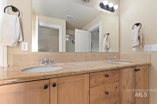 3052 N Christian Way, Meridian, ID 83646 - full bathroom with double vanity and a shower with door