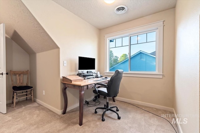 3052 N Christian Way, Meridian, ID 83646 - office area featuring a textured ceiling, light carpet, and vaulted ceiling