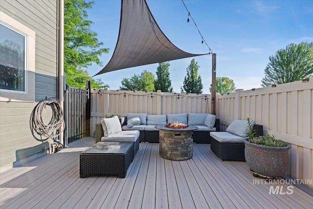 3052 N Christian Way, Meridian, ID 83646 - wooden deck with an outdoor living space with a fire pit and a fenced backyard