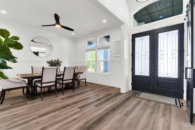 11127 Lake Lowell Ave, Nampa, ID 83686 - entryway with a decorative wall, light wood-style floors, a ceiling fan, recessed lighting, and a wainscoted wall
