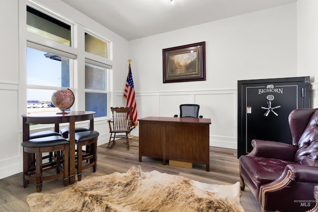 11127 Lake Lowell Ave, Nampa, ID 83686 - office area with a decorative wall, wood finished floors, and a wainscoted wall