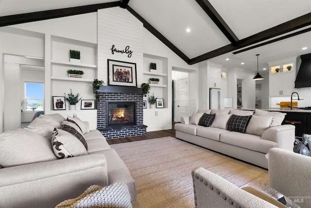 11127 Lake Lowell Ave, Nampa, ID 83686 - living room with wood finished floors, a fireplace, and recessed lighting