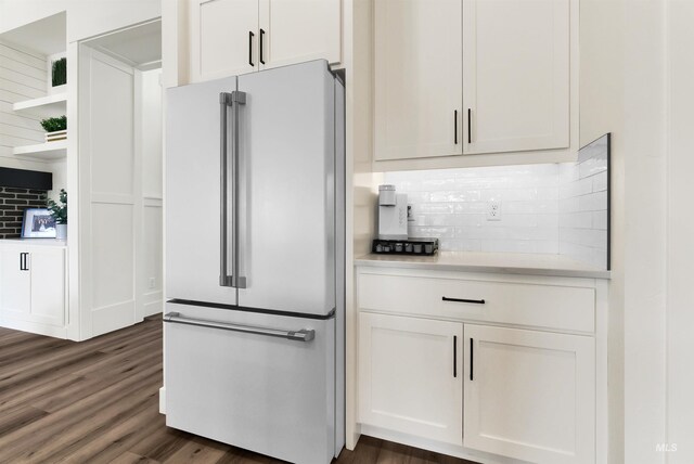11127 Lake Lowell Ave, Nampa, ID 83686 - kitchen with freestanding refrigerator, tasteful backsplash, light countertops, and white cabinetry