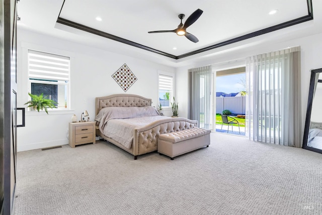 11127 Lake Lowell Ave, Nampa, ID 83686 - carpeted bedroom featuring a raised ceiling, access to outside, ornamental molding, ceiling fan, and baseboards