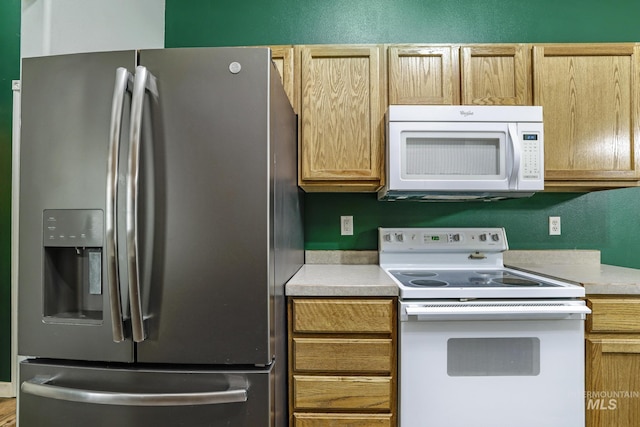 224 Paintbrush Cir, Twin Falls, ID 83301 - kitchen with white appliances and light countertops