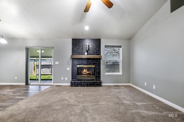 224 Paintbrush Cir, Twin Falls, ID 83301 - unfurnished living room with healthy amount of natural light, ceiling fan, a tile fireplace, and baseboards