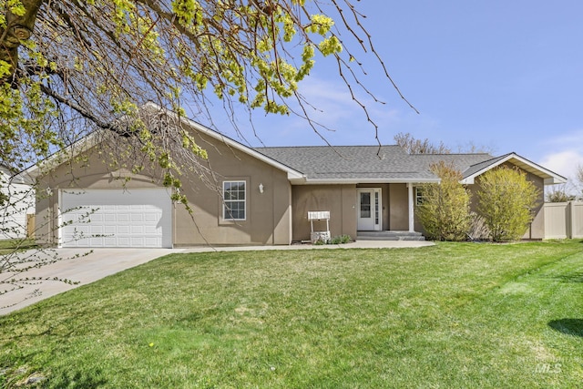 224 Paintbrush Cir, Twin Falls, ID 83301 - ranch-style home with stucco siding, an attached garage, driveway, and roof with shingles