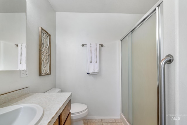 224 Paintbrush Cir, Twin Falls, ID 83301 - bathroom with a shower stall, vanity, toilet, and tile patterned floors