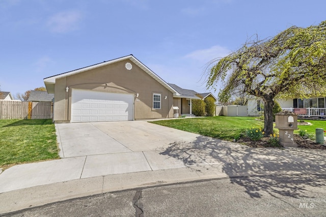 224 Paintbrush Cir, Twin Falls, ID 83301 - ranch-style home with concrete driveway, a garage, and stucco siding