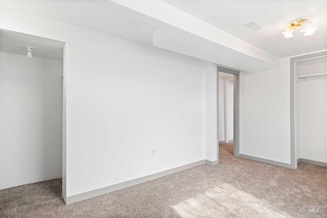 interior space featuring baseboards, a closet, visible vents, and carpet flooring