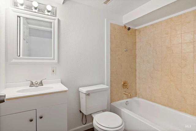 bathroom with  shower combination, vanity, and toilet