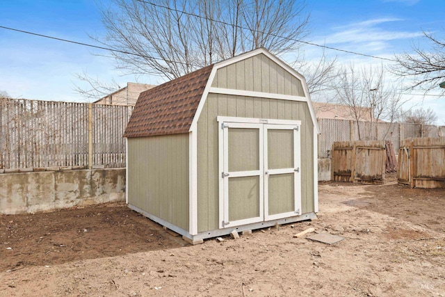 view of shed featuring a fenced backyard