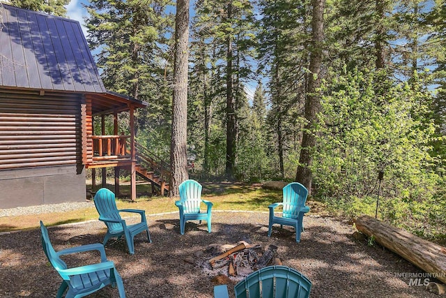 1221 Fox Rd, Cascade, ID 83611 - view of yard featuring an outdoor fire pit and stairway