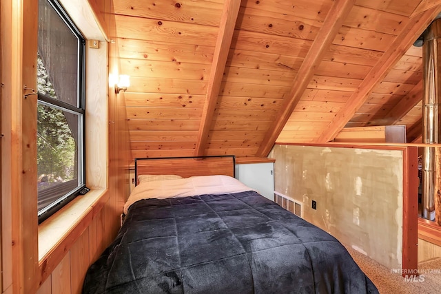1221 Fox Rd, Cascade, ID 83611 - carpeted bedroom featuring wooden ceiling and wood walls