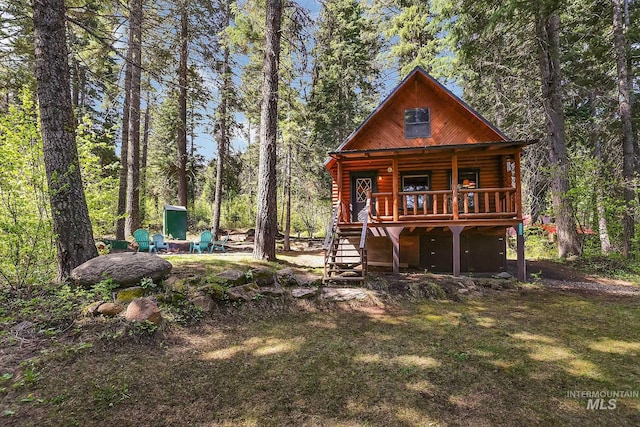 1221 Fox Rd, Cascade, ID 83611 - rear view of house featuring stairs