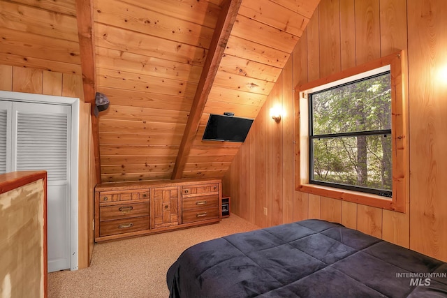 1221 Fox Rd, Cascade, ID 83611 - bedroom featuring wood ceiling, light carpet, and wood walls