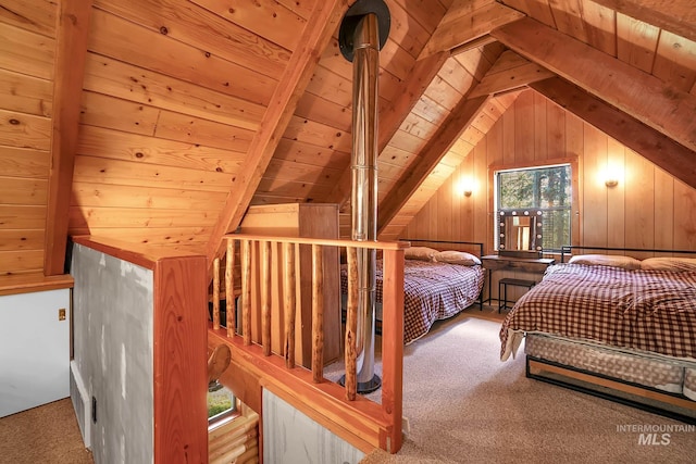1221 Fox Rd, Cascade, ID 83611 - bedroom with carpet flooring, wood ceiling, and wood walls