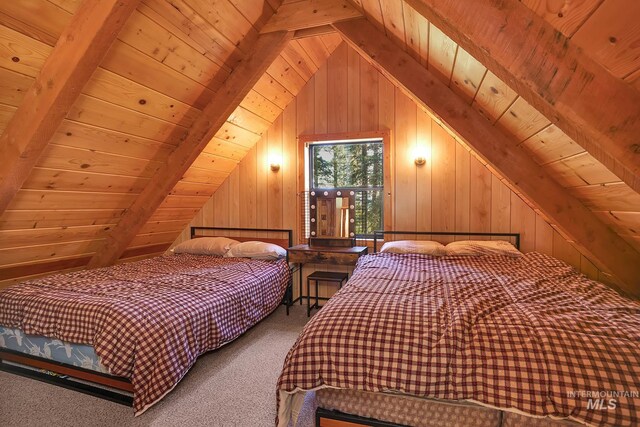 1221 Fox Rd, Cascade, ID 83611 - carpeted bedroom featuring wooden ceiling and wood walls