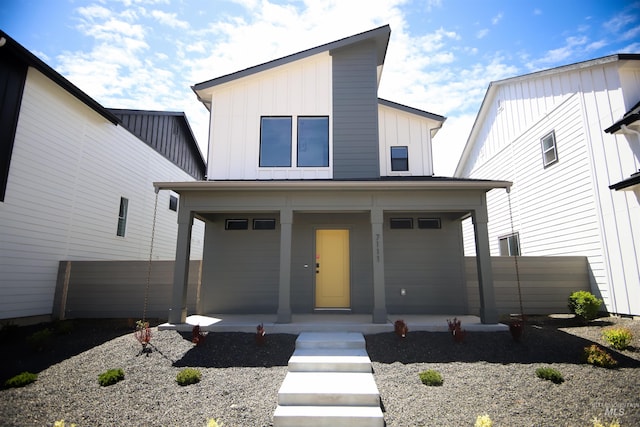 6795 W Fairy Falls Dr, Meridian, ID 83646 - view of front of property featuring covered porch and board and batten siding
