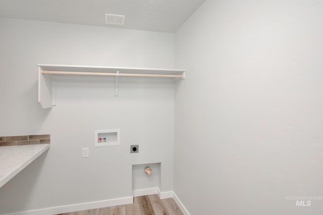 6795 W Fairy Falls Dr, Meridian, ID 83646 - laundry area with light wood finished floors, visible vents, washer hookup, laundry area, and hookup for an electric dryer