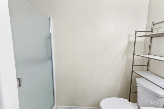 3000 E Ohio Ave, Nampa, ID 83686 - bathroom with toilet and baseboards