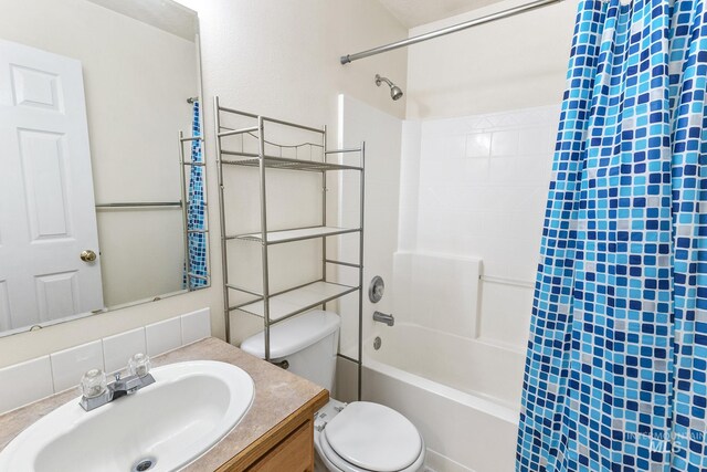 3000 E Ohio Ave, Nampa, ID 83686 - bathroom with toilet, shower / bathtub combination with curtain, vanity, and tasteful backsplash
