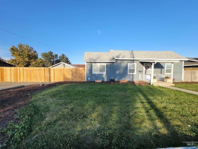 view of front of property with a front lawn