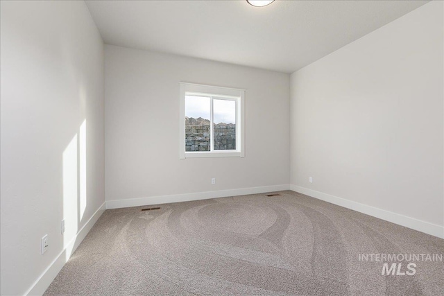 3484 W Retreat St Lot 23/6, Eagle, ID 83616 - empty room featuring carpet flooring and baseboards