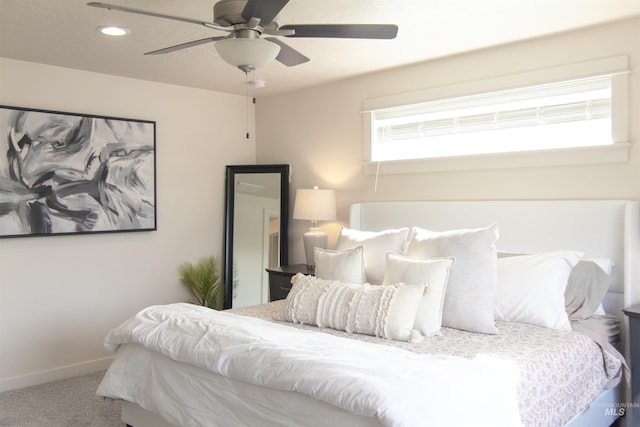 carpeted bedroom with a ceiling fan, recessed lighting, and baseboards