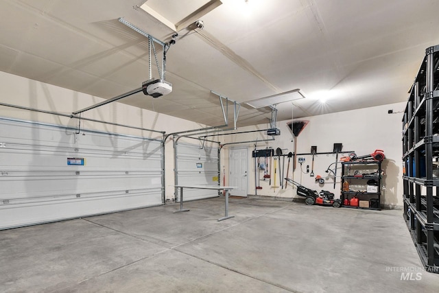 garage featuring a garage door opener