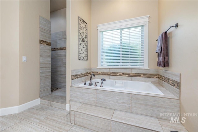 11954 W Meadowfalls Dr, Star, ID 83669 - bathroom with a bath and walk in shower