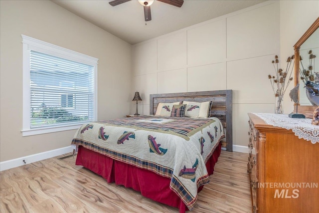 11954 W Meadowfalls Dr, Star, ID 83669 - bedroom with light wood-type flooring and a ceiling fan