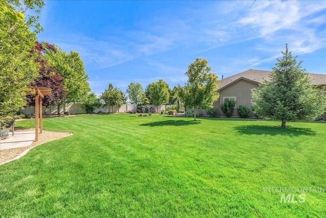 11954 W Meadowfalls Dr, Star, ID 83669 - view of fenced backyard