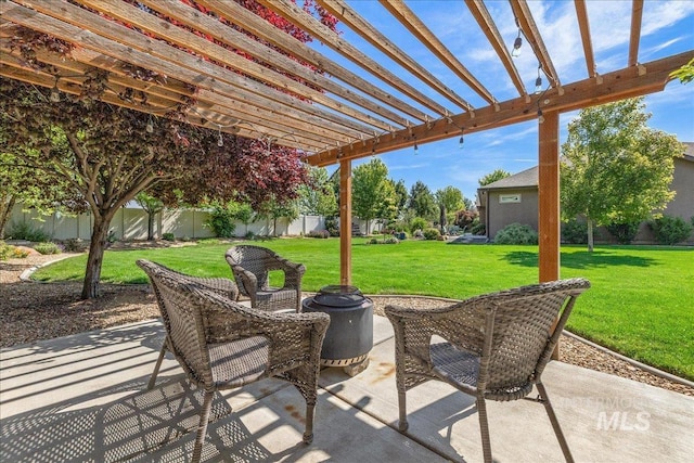11954 W Meadowfalls Dr, Star, ID 83669 - fenced backyard with a pergola and a patio area