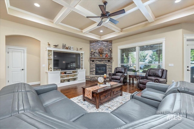 11954 W Meadowfalls Dr, Star, ID 83669 - living area with wood finished floors, a ceiling fan, coffered ceiling, beamed ceiling, and a fireplace