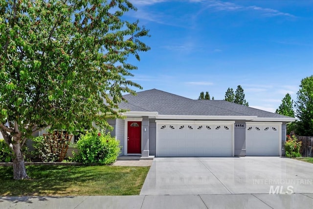 4456 N Weston Ave, Meridian, ID 83646 - single story home featuring an attached garage, concrete driveway, a front yard, and a shingled roof