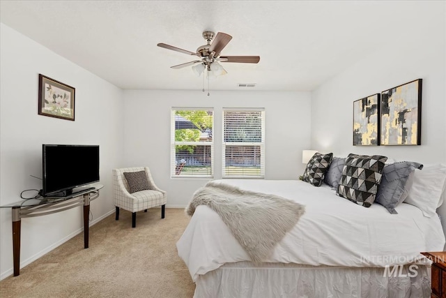 4456 N Weston Ave, Meridian, ID 83646 - bedroom featuring light carpet, baseboards, and ceiling fan