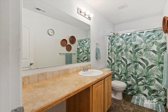 4456 N Weston Ave, Meridian, ID 83646 - bathroom featuring vanity, toilet, and a shower with shower curtain