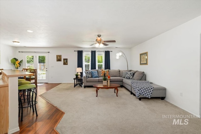 4456 N Weston Ave, Meridian, ID 83646 - living room featuring ceiling fan, wood finished floors, and baseboards