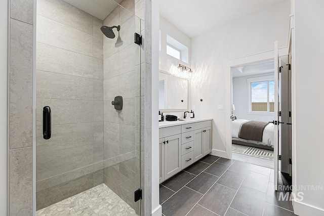 6998 S Tindaris Ave, Meridian, ID 83642 - full bathroom featuring double vanity, a stall shower, and healthy amount of natural light