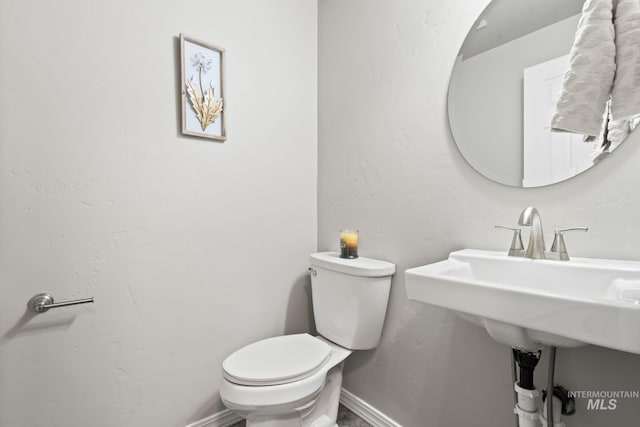 2155 N Fairmeadow Dr, Boise, ID 83704 - bathroom featuring toilet and baseboards