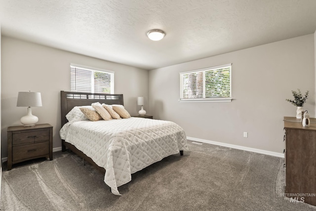 2155 N Fairmeadow Dr, Boise, ID 83704 - bedroom with baseboards, multiple windows, and carpet