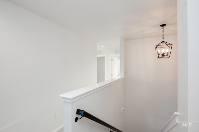5289 E Grizzly St, Nampa, ID 83687 - interior space featuring baseboards and an inviting chandelier