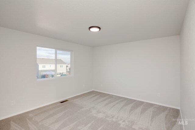 5289 E Grizzly St, Nampa, ID 83687 - unfurnished room with carpet flooring, visible vents, and baseboards