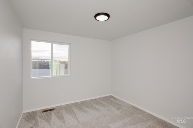 5289 E Grizzly St, Nampa, ID 83687 - carpeted empty room featuring baseboards and visible vents