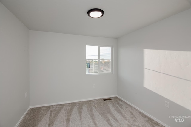 5289 E Grizzly St, Nampa, ID 83687 - unfurnished room featuring baseboards and carpet floors