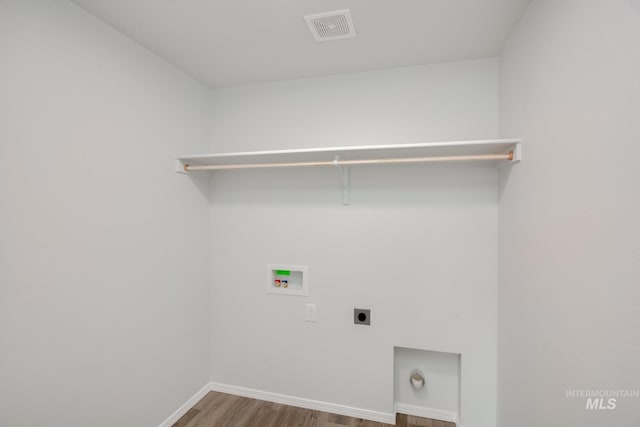 5289 E Grizzly St, Nampa, ID 83687 - washroom featuring wood finished floors, electric dryer hookup, laundry area, hookup for a washing machine, and visible vents