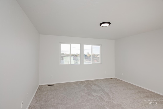 5289 E Grizzly St, Nampa, ID 83687 - carpeted empty room featuring baseboards and visible vents