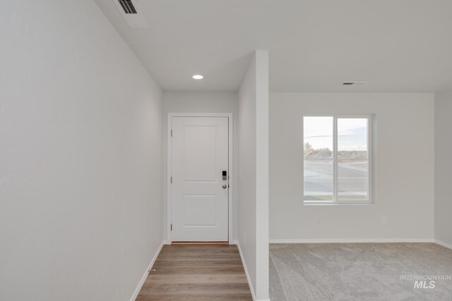 5289 E Grizzly St, Nampa, ID 83687 - doorway featuring baseboards, visible vents, and recessed lighting